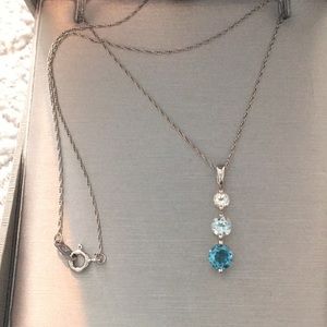 Blue topaz pendant on 18” chain. NWOT